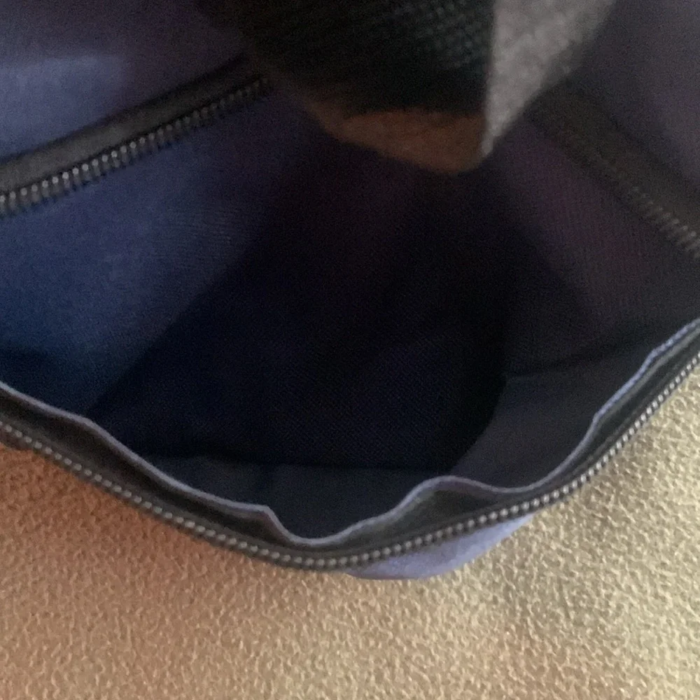 Smithsonian Air & Space blue and black duffel bag. Approx 17” x 9” x 7 1/4”